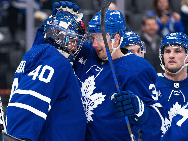 TORONTO, CANADA - APRIL 08: Jett Alexander #40 and Justin Holl #3 of the Toronto Maple Leafs celebrate their win against the Montreal Canadiens at the Scotiabank Arena on April 08, 2023 in Toronto, Ontario, Canada.