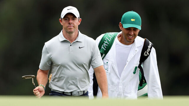 AUGUSTA, GEORGIA - APRIL 07: Rory McIlroy of Northern Ireland and caddie Harry Diamond walk up the 18th green during the second round of the 2023 Masters Tournament at Augusta National Golf Club on April 07, 2023 in Augusta, Georgia.
