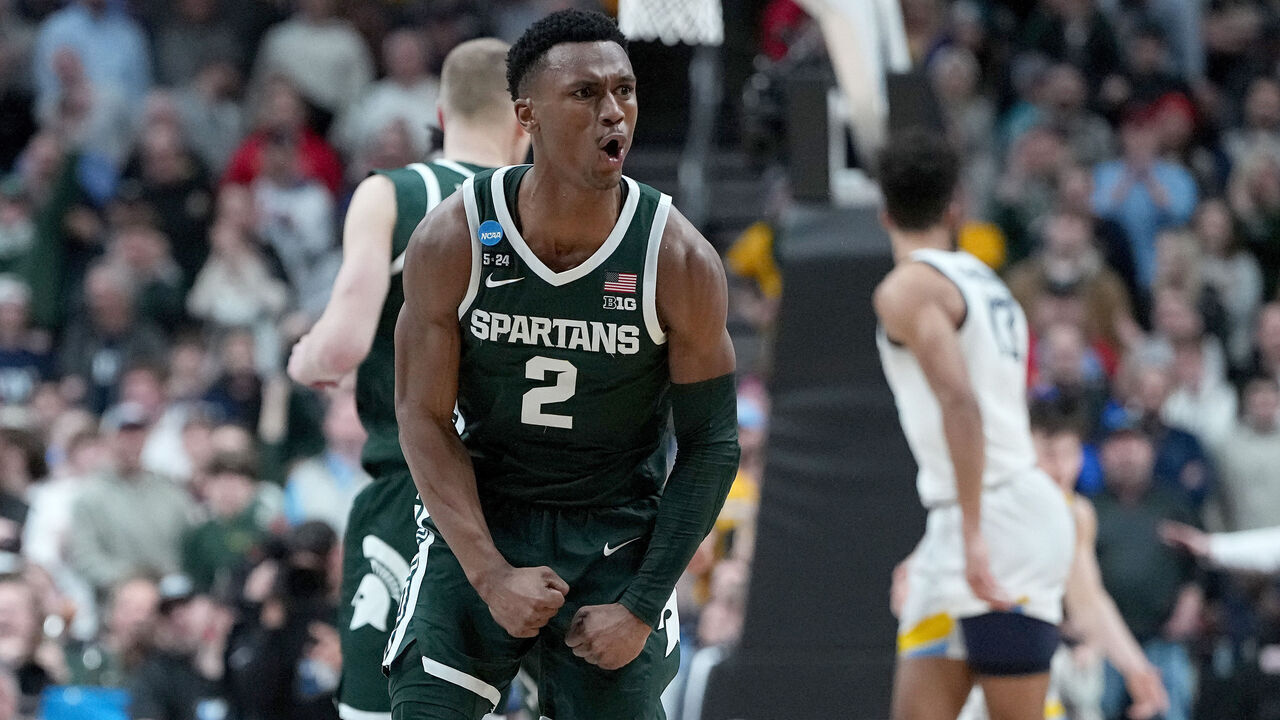 COLUMBUS, OHIO - MARCH 19: Tyson Walker #2 of the Michigan State Spartans celebrates a basket against the Marquette Golden Eagles during the second half in the second round game of the NCAA Men's Basketball Tournament at Nationwide Arena on March 19, 2023 in Columbus, Ohio.