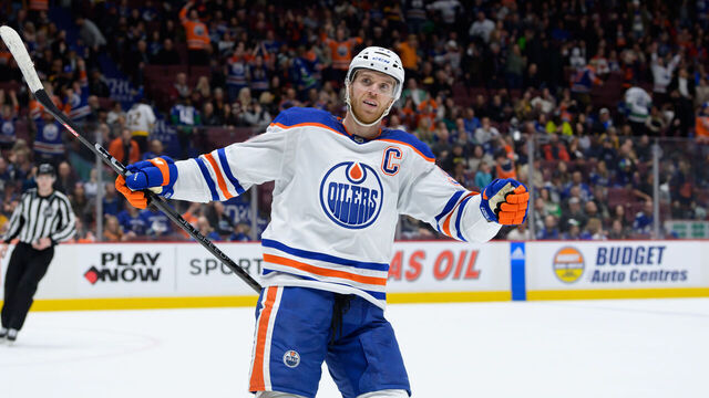 VANCOUVER, BC - JANUARY 21: Edmonton Oilers center Connor McDavid (97) celebrates after a goal during their NHL game against the Vancouver Canucks at Rogers Arena on January 21, 2023 in Vancouver, British Columbia, Canada.