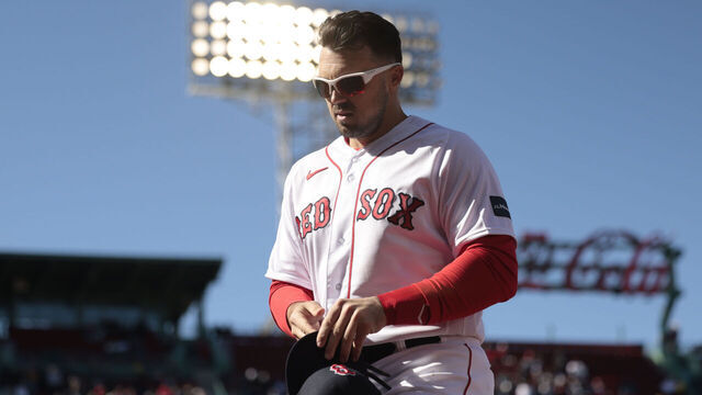 BOSTON, MASSACHUSETTS - APRIL 02: Adam Duvall #18 of the Boston Red Sox looks on during the seventh inning against the Baltimore Orioles at Fenway Park on April 02, 2023 in Boston, Massachusetts.