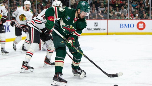 SAINT PAUL, MN - MARCH 19: Minnesota Wild left wing Marcus Johansson (90) skates with the puck during the NHL game between the Chicago Blackhawks and Minnesota Wild, on March 25th, 2023, at the Xcel Energy Center in Saint Paul, MN.