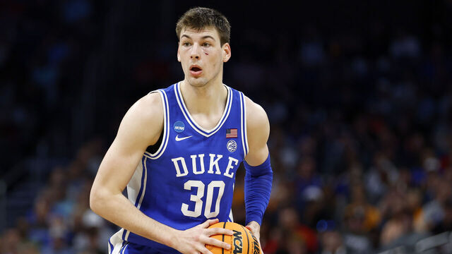ORLANDO, FLORIDA - MARCH 18: Kyle Filipowski #30 of the Duke Blue Devils handles the ball during the first half of the game against the Tennessee Volunteers in the second round of the NCAA Men's Basketball Tournament at Amway Center on March 18, 2023 in Orlando, Florida.