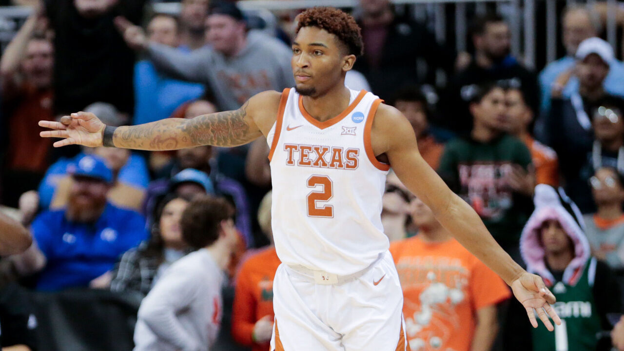 KANSAS CITY, MO - MARCH 26: Texas Longhorns guard Arterio Morris #2 celebrates a three-point basket against the Miami Hurricanes during the Elite Eight round of the 2023 NCAA Men's Basketball Tournament Midwest Regionals held at T-Mobile Center on March 26, 2023 in Kansas City, Missouri.