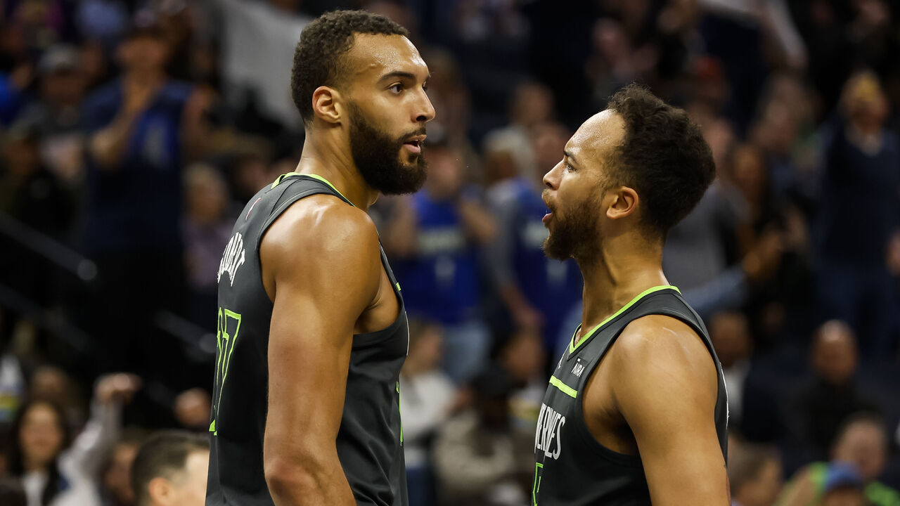 MINNEAPOLIS, MN - MARCH 10: Kyle Anderson #5 celebrates a dunk by Rudy Gobert #27 of the Minnesota Timberwolves against the Brooklyn Nets in the fourth quarter of the game at Target Center on March 10, 2023 in Minneapolis, Minnesota. The Nets defeated the Timberwolves 124-123 in overtime.