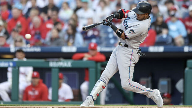 PHILADELPHIA, PENNSYLVANIA - APRIL 10: Luis Arraez #3 of the Miami Marlins hits a single during the first inning against the Philadelphia Phillies at Citizens Bank Park on April 10, 2023 in Philadelphia, Pennsylvania.