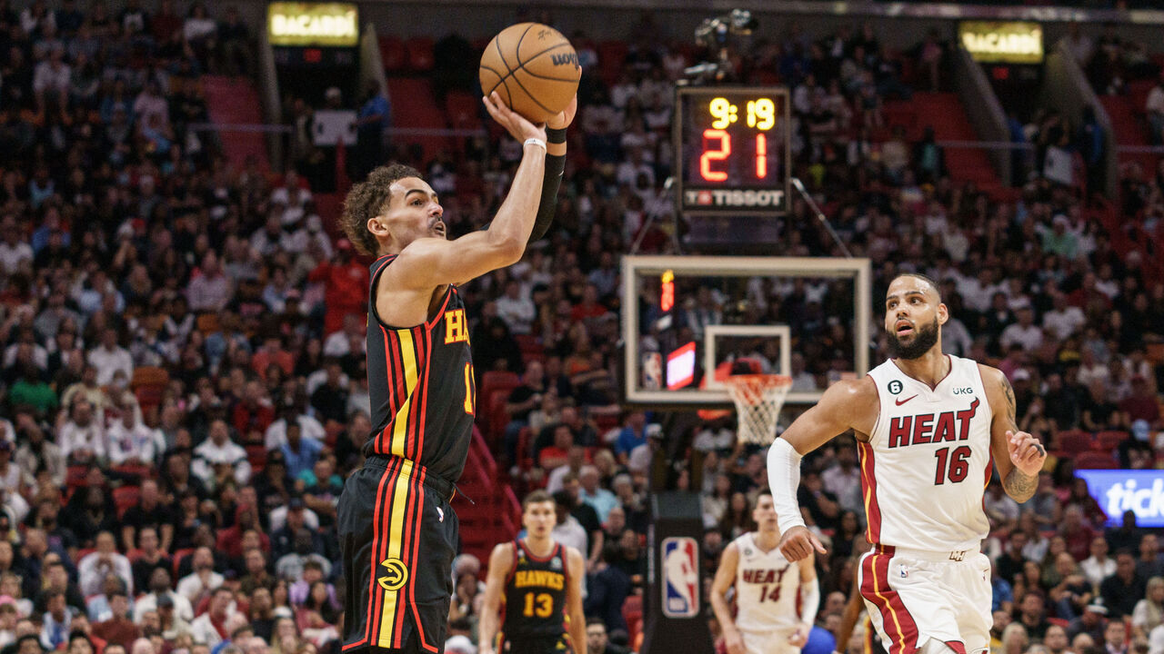 MIAMI, FL - APRIL 11: Trae Young #11 of the Atlanta Hawks shoots in the second quarter against the Miami Heat at Kaseya Center on April 11, 2023 in Miami, Florida.