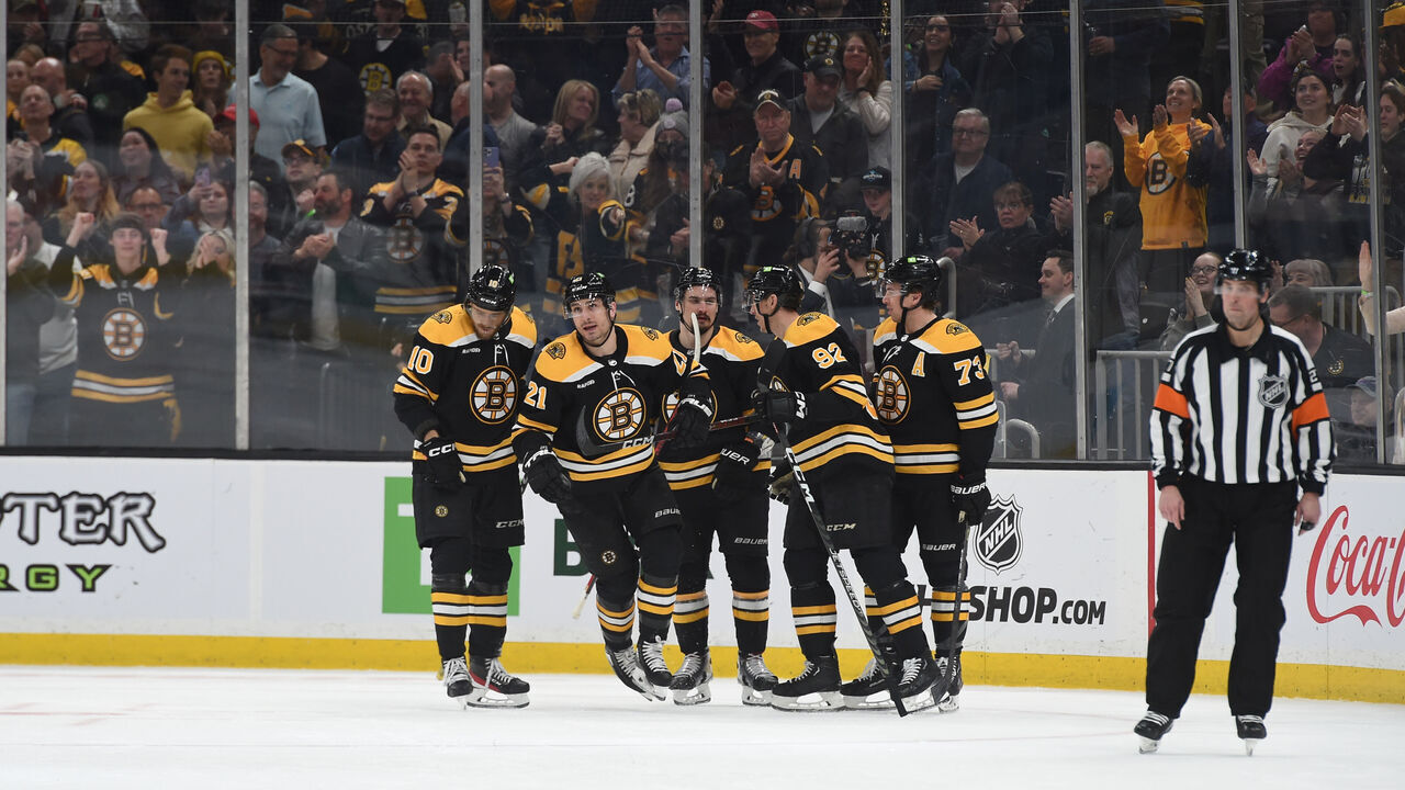BOSTON, MASSACHUSETTS - APRIL 11: Garnet Hathaway #21 of the Boston Bruins scores in the third period against the Washington Capitals at the TD Garden on April 11, 2023 in Boston, Massachusetts.
