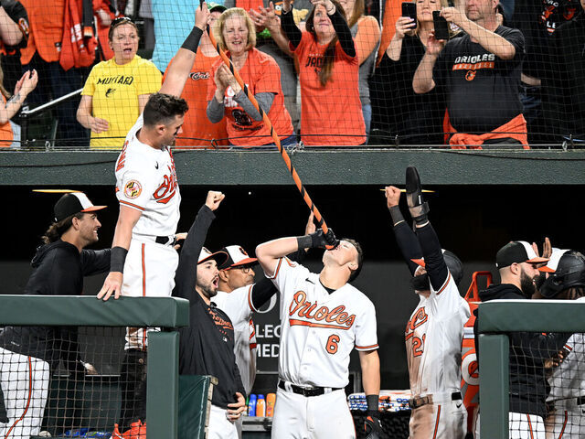BALTIMORE, MARYLAND - APRIL 11: Ryan Mountcastle #6 of the Baltimore Orioles celebrates with teammates after hitting a Grand Slam in the seventh inning against the Oakland Athletics at Oriole Park at Camden Yards on April 11, 2023 in Baltimore, Maryland.