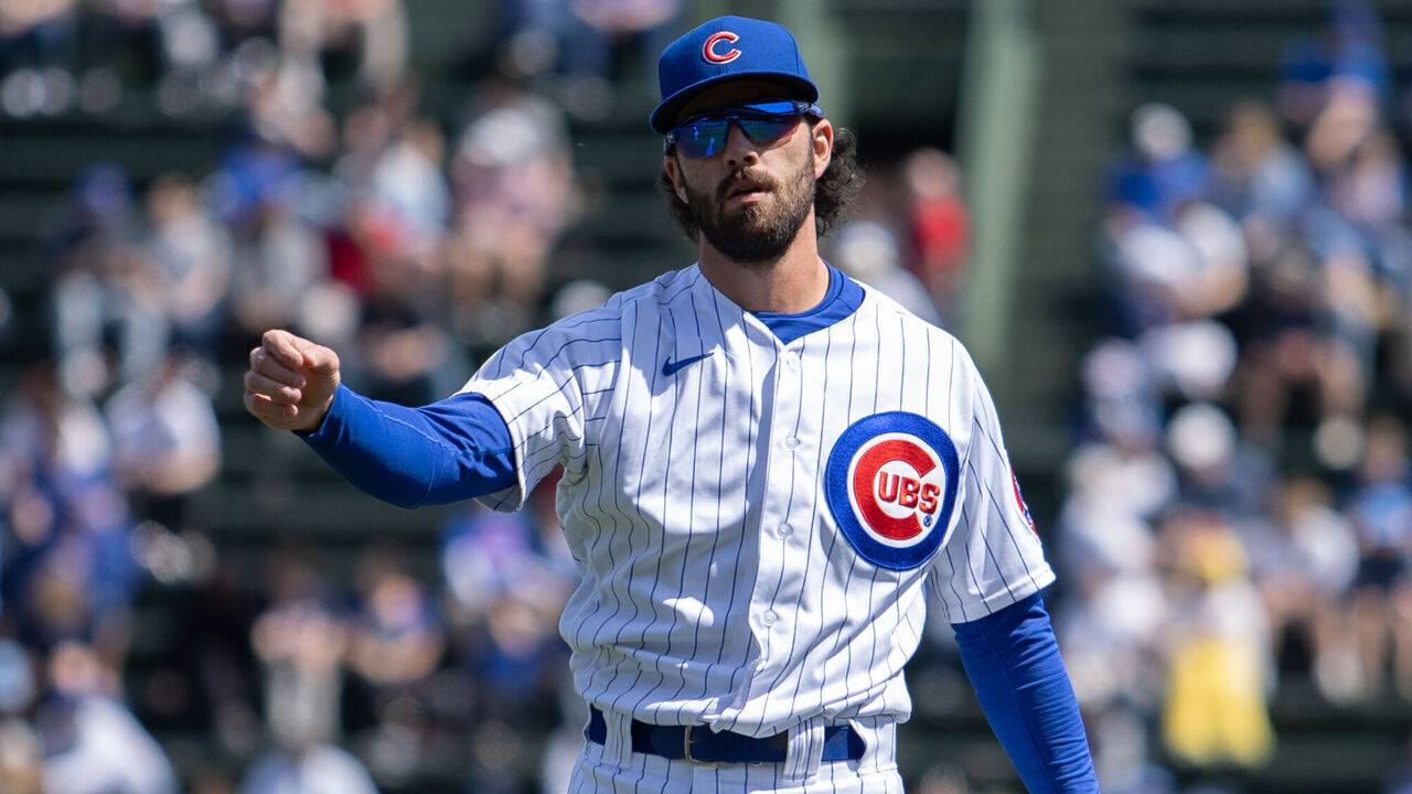 CHICAGO, IL - APRIL 09: Chicago Cubs shortstop Dansby Swanson (7) warms up before a Major League Baseball game between the Texas Rangers and the Chicago Cubs on April 09, 2023 at Wrigley Field in Chicago, IL.