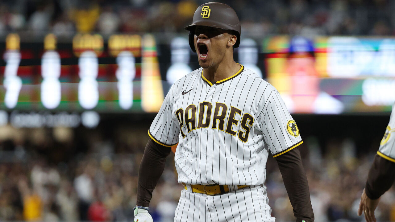 SAN DIEGO, CALIFORNIA - OCTOBER 15: Juan Soto #22 of the San Diego Padres celebrates after hitting a RBI single during the seventh inning against the Los Angeles Dodgers in game four of the National League Division Series at PETCO Park on October 15, 2022 in San Diego, California.