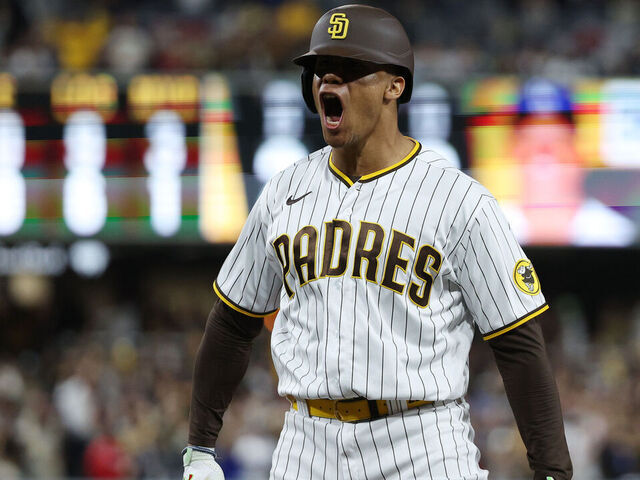 SAN DIEGO, CALIFORNIA - OCTOBER 15: Juan Soto #22 of the San Diego Padres celebrates after hitting a RBI single during the seventh inning against the Los Angeles Dodgers in game four of the National League Division Series at PETCO Park on October 15, 2022 in San Diego, California.