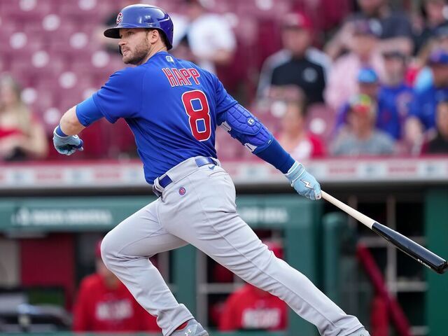 CINCINNATI, OHIO - APRIL 04: Ian Happ #8 of the Chicago Cubs hits a single in the first inning against the Cincinnati Reds at Great American Ball Park on April 04, 2023 in Cincinnati, Ohio.