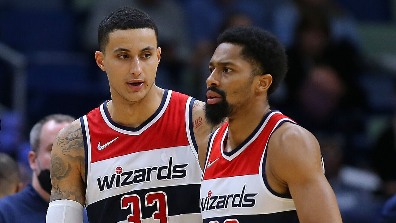 NEW ORLEANS, LOUISIANA - NOVEMBER 24: Kyle Kuzma #33 of the Washington Wizards talks to Spencer Dinwiddie #26 during the second half of a game against the New Orleans Pelicans at the Smoothie King Center on November 24, 2021 in New Orleans, Louisiana.