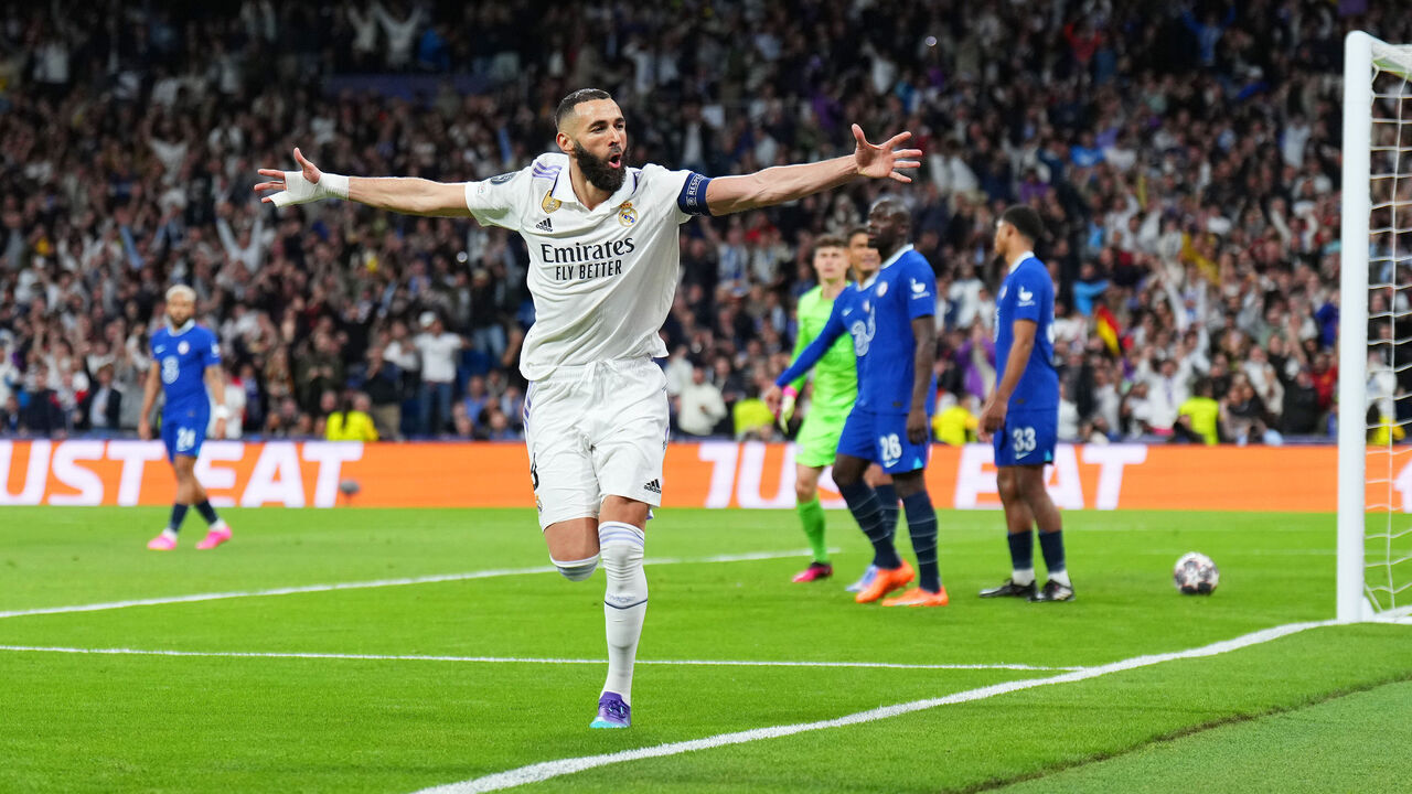 MADRID, SPAIN - APRIL 12: Karim Benzema of Real Madrid celebrates after scoring the team's first goal during the UEFA Champions League quarterfinal first leg match between Real Madrid and Chelsea FC at Estadio Santiago Bernabeu on April 12, 2023 in Madrid, Spain.