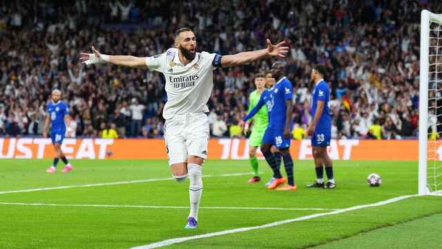 MADRID, SPAIN - APRIL 12: Karim Benzema of Real Madrid celebrates after scoring the team's first goal during the UEFA Champions League quarterfinal first leg match between Real Madrid and Chelsea FC at Estadio Santiago Bernabeu on April 12, 2023 in Madrid, Spain.