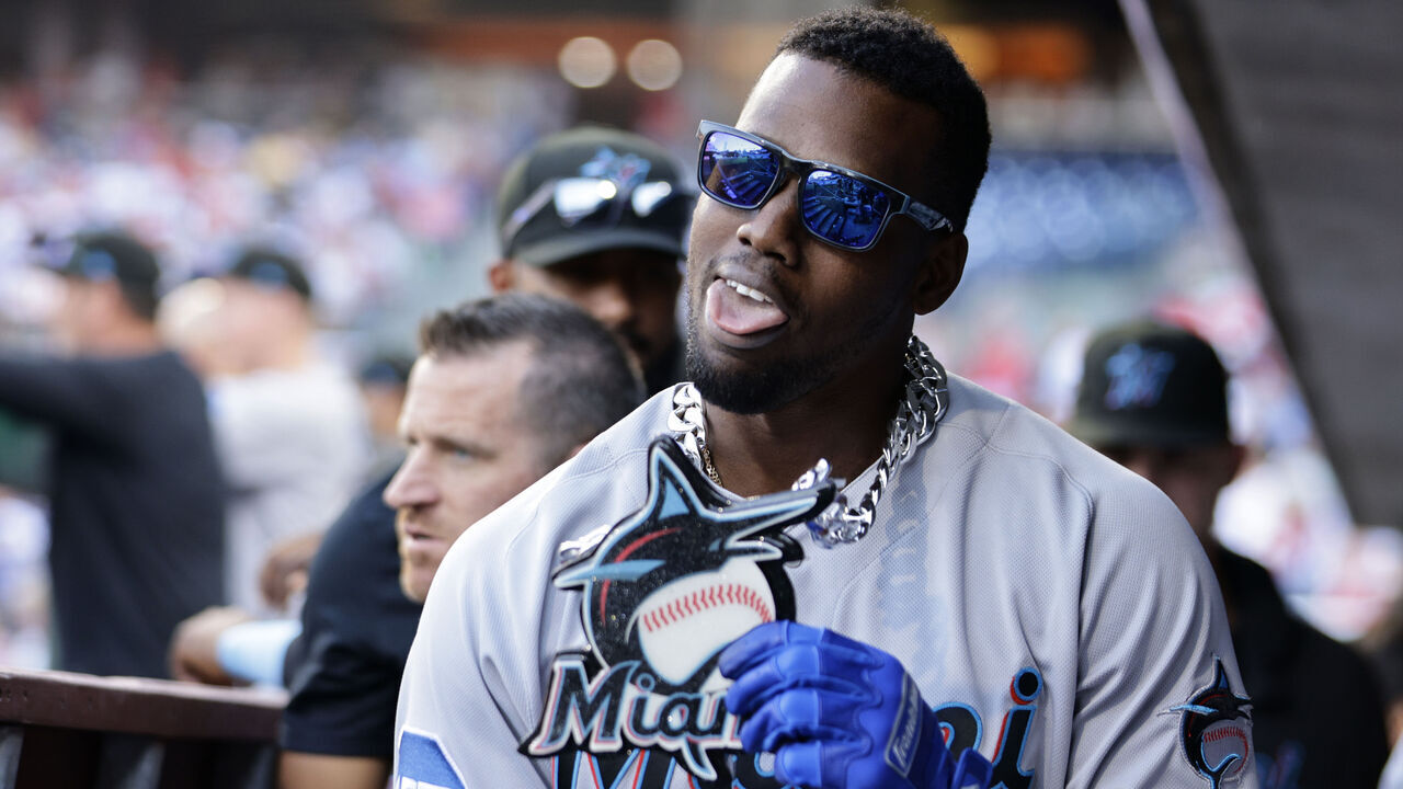 PHILADELPHIA, PA - APRIL 12: Jorge Soler #12 of the Miami Marlins gestures with a Marlins chain after hitting homer to tie the game in the eighth inning against the Philadelphia Phillies in a game at Citizens Bank Park on April 12, 2023 in Philadelphia, Pennsylvania.