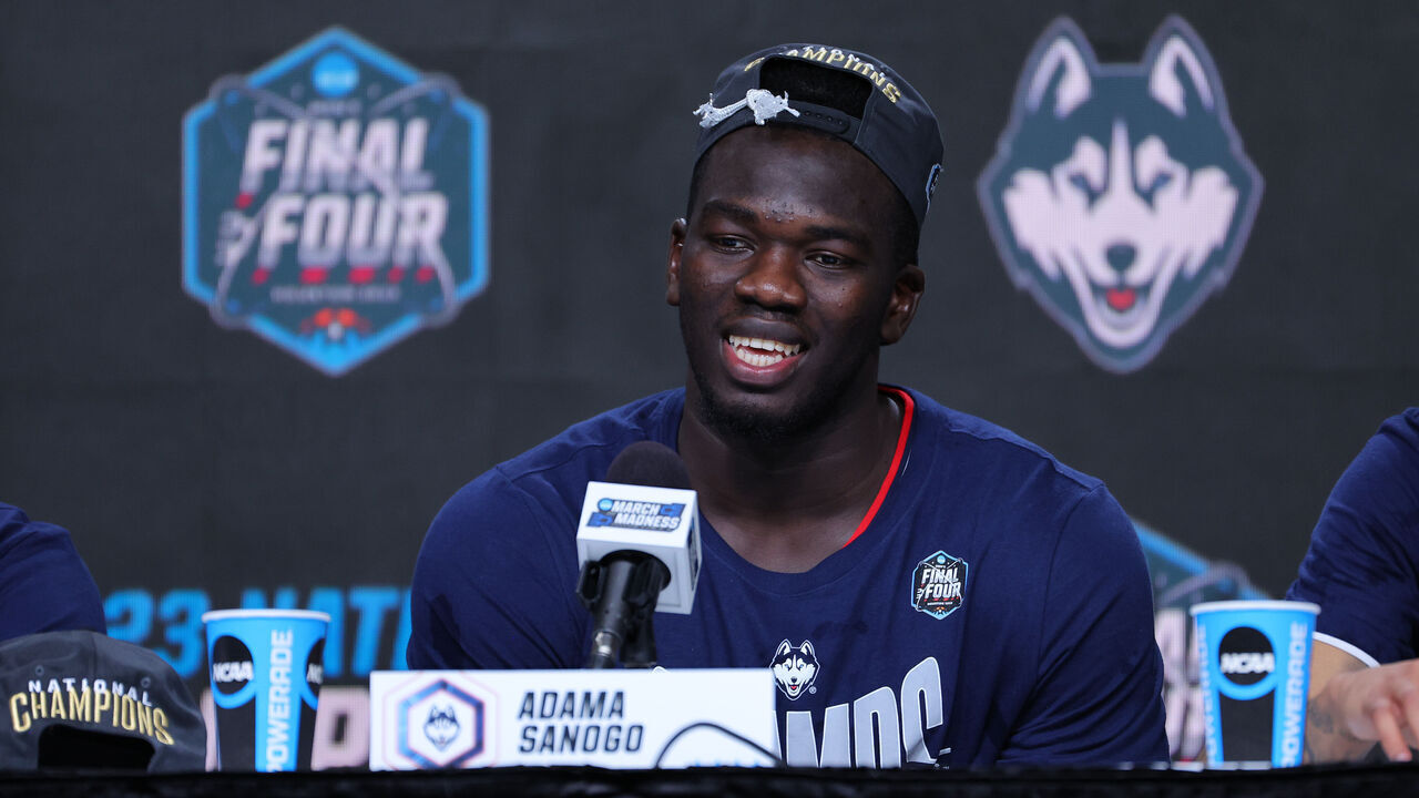 HOUSTON, TEXAS - APRIL 03: Adama Sanogo #21 of the Connecticut Huskies talks during the press conference after they defeated the San Diego State Aztecs to win the NCAA Men's Basketball Tournament National Championship at NRG Stadium on April 03, 2023 in Houston, Texas.