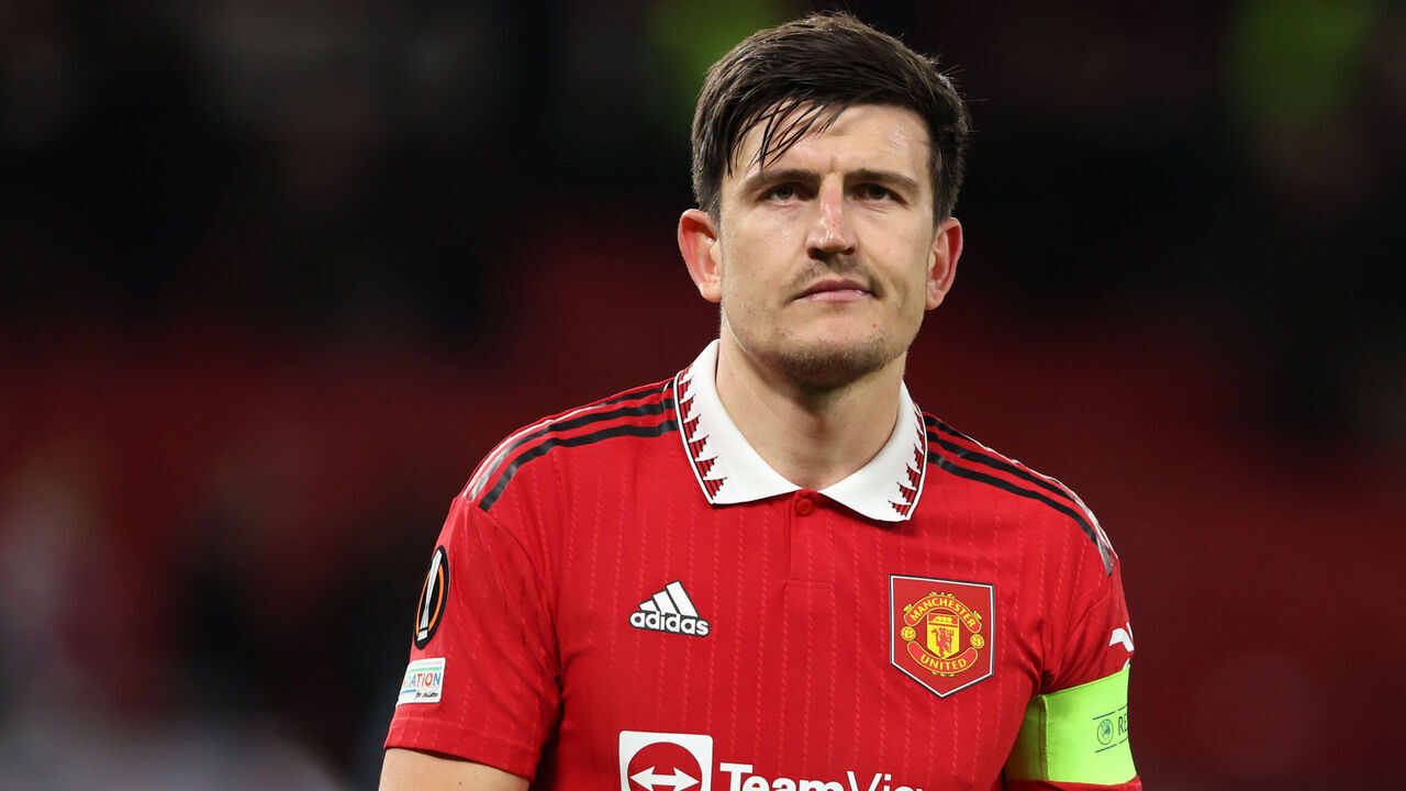 MANCHESTER, ENGLAND - APRIL 13: A dejected Harry Maguire of Manchester United walks off at full time during the UEFA Europa League quarterfinal first leg match between Manchester United and Sevilla FC at Old Trafford on April 13, 2023 in Manchester, United Kingdom.