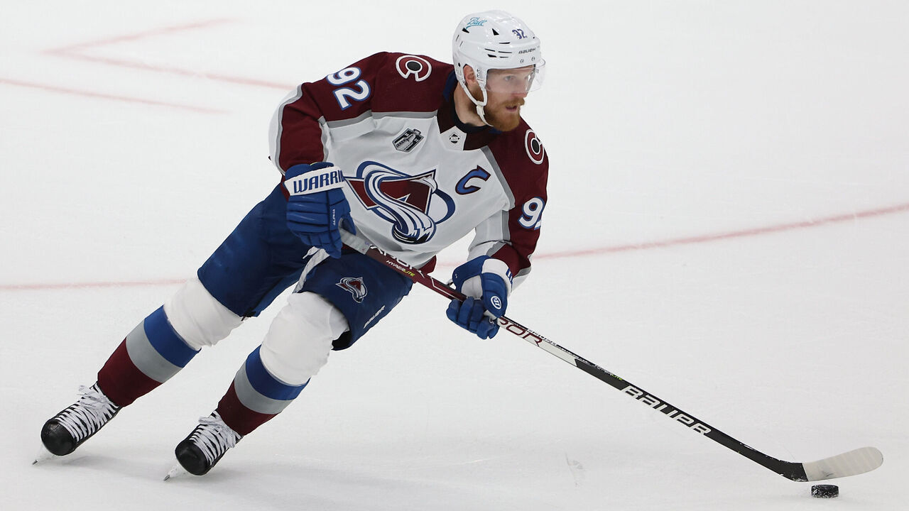 TAMPA, FLORIDA - JUNE 26: Gabriel Landeskog #92 of the Colorado Avalanche skates with the puck in Game Six of the 2022 NHL Stanley Cup Final at Amalie Arena on June 26, 2022 in Tampa, Florida. The Avalanche defeated the Lightning 2-1.