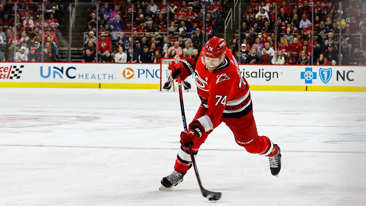 RALEIGH, NC - APRIL 11: Jaccob Slavin #74 of the Carolina Hurricanes shoots the puck during the second period of the game against the Detroit Red Wings at PNC Arena on April 11, 2023 in Raleigh, North Carolina.