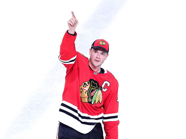 CHICAGO, ILLINOIS - APRIL 13: Jonathan Toews #19 of the Chicago Blackhawks waves to the crowd following a game against the Philadelphia Flyers at United Center on April 13, 2023 in Chicago, Illinois. The Flyers won 5-4 in overtime.