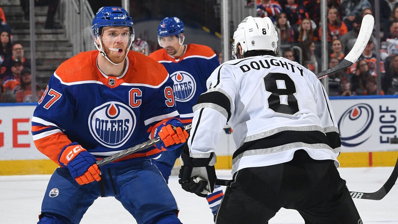 EDMONTON, CANADA - MARCH 30: Connor McDavid #97 of the Edmonton Oilers and Drew Doughty #8 of the Los Angeles Kings skate during the game on March 30, 2023 at Rogers Place in Edmonton, Alberta, Canada.