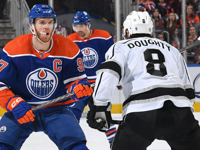EDMONTON, CANADA - MARCH 30: Connor McDavid #97 of the Edmonton Oilers and Drew Doughty #8 of the Los Angeles Kings skate during the game on March 30, 2023 at Rogers Place in Edmonton, Alberta, Canada.