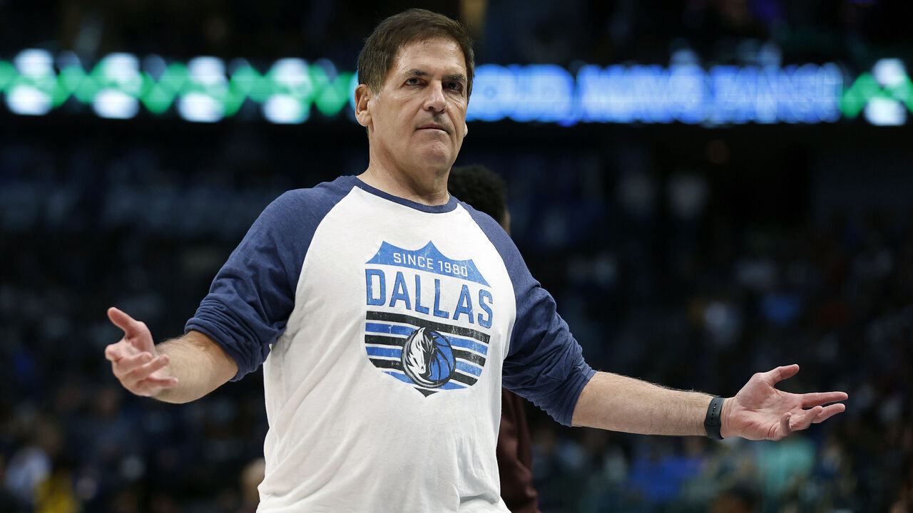 DALLAS, TEXAS - MARCH 22: Dallas Mavericks owner Mark Cuban reacts during a timeout in the game against the Golden State Warriors at American Airlines Center on March 22, 2023 in Dallas, Texas.