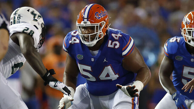 GAINESVILLE, FL - SEPTEMBER 17: Florida Gators offensive lineman O'Cyrus Torrence (54) blocks during the game between the South Florida Bulls and the Florida Gators on September, 17 2022 at Ben Hill Griffin Stadium at Florida Field in Gainesville, Fl.
