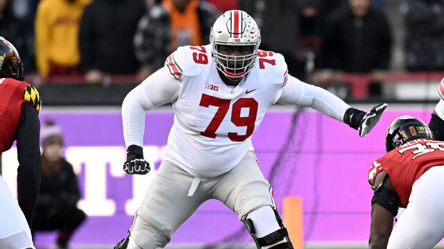 COLLEGE PARK, MARYLAND - NOVEMBER 19: Dawand Jones #79 of the Ohio State Buckeyes blocks against the Maryland Terrapins at SECU Stadium on November 19, 2022 in College Park, Maryland.