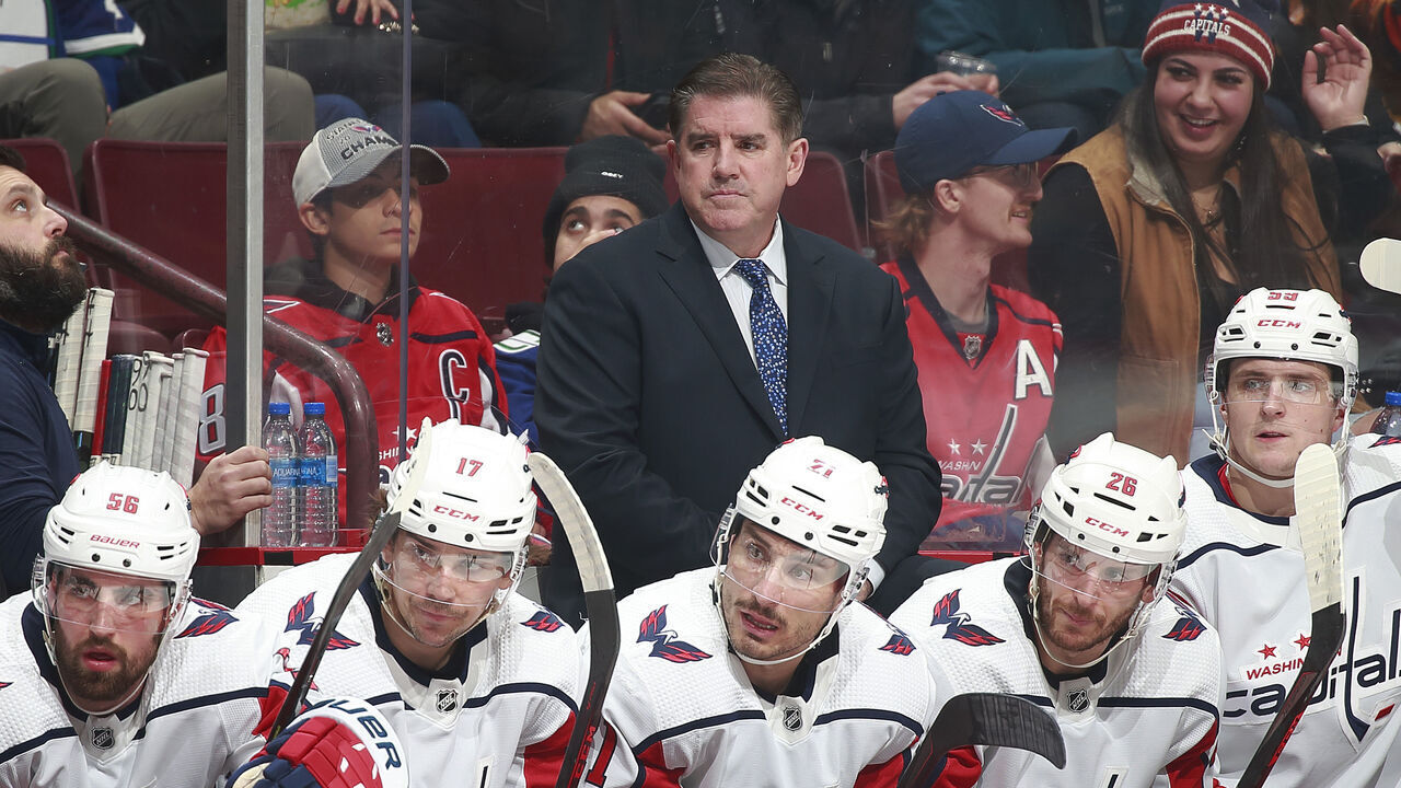 VANCOUVER, CANADA - NOVEMBER 29: Head coach Peter Laviolette of the Washington Capitals looks on from the bench during their NHL game against the Vancouver Canucks at Rogers Arena November 29, 2022 in Vancouver, British Columbia, Canada.
