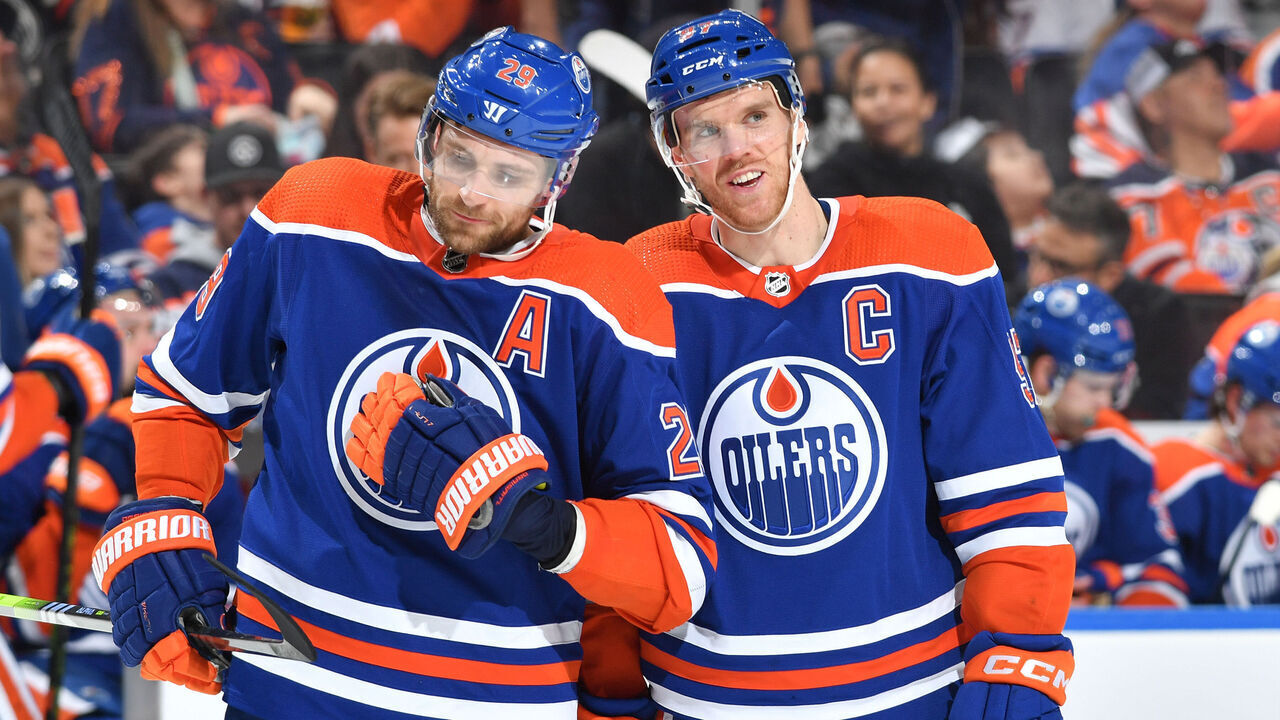EDMONTON, CANADA - APRIL 01: Connor McDavid #97 and Leon Draisaitl #29 of the Edmonton Oilers have a conversation while awaiting a face-off during the game against the Anaheim Ducks on April 1, 2023 at Rogers Place in Edmonton, Alberta, Canada.