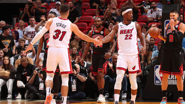 MIAMI, FL - APRIL 14: Max Strus #31 and Jimmy Butler #22 of the Miami Heat high five during the game against the Chicago Bulls during the 2023 Play-In Tournament on April 14, 2023 at the Kaseya Center in Miami, Florida. Mandatory Copyright Notice: Copyright 2023 NBAE