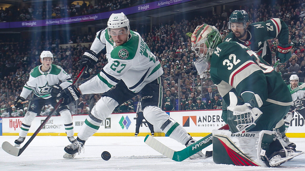 SAINT PAUL, MN - FEBRUARY 17: Filip Gustavsson #32 of the Minnesota Wild makes a save against Mason Marchment #27 of the Dallas Stars during the game at the Xcel Energy Center on February 17, 2023 in Saint Paul, Minnesota.