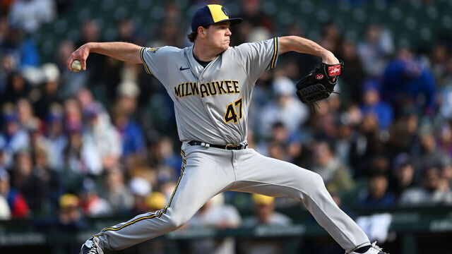 CHICAGO, ILLINOIS - APRIL 02: Gus Varland #47 of the Milwaukee Brewers pitches against the Chicago Cubs at Wrigley Field on April 02, 2023 in Chicago, Illinois.