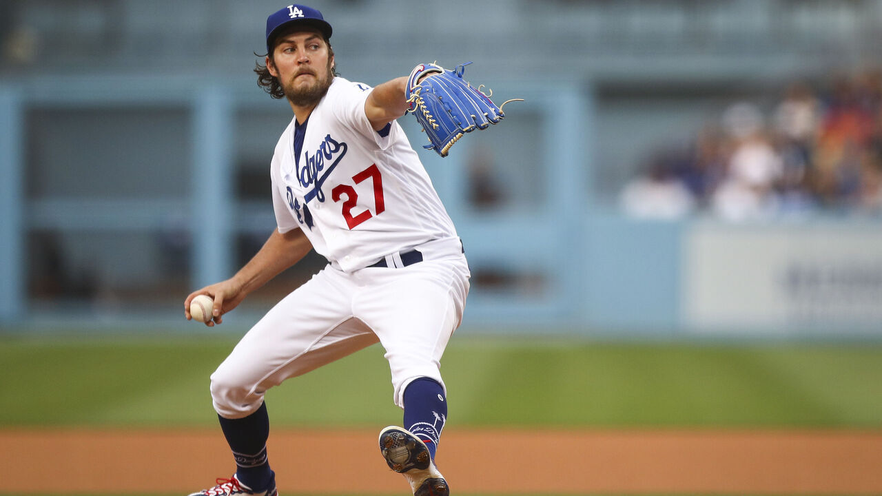 LOS ANGELES, CALIFORNIA - JUNE 28: Trevor Bauer #27 of the Los Angeles Dodgers throws the first pitch of the game against the San Francisco Giants at Dodger Stadium on June 28, 2021 in Los Angeles, California.