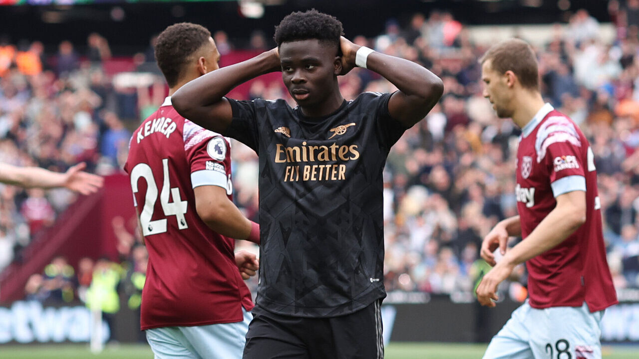 LONDON, ENGLAND - APRIL 16: Bukayo Saka of Arsenal looks dejected after missing a penalty during the Premier League match between West Ham United and Arsenal FC at London Stadium on April 16, 2023 in London, United Kingdom.