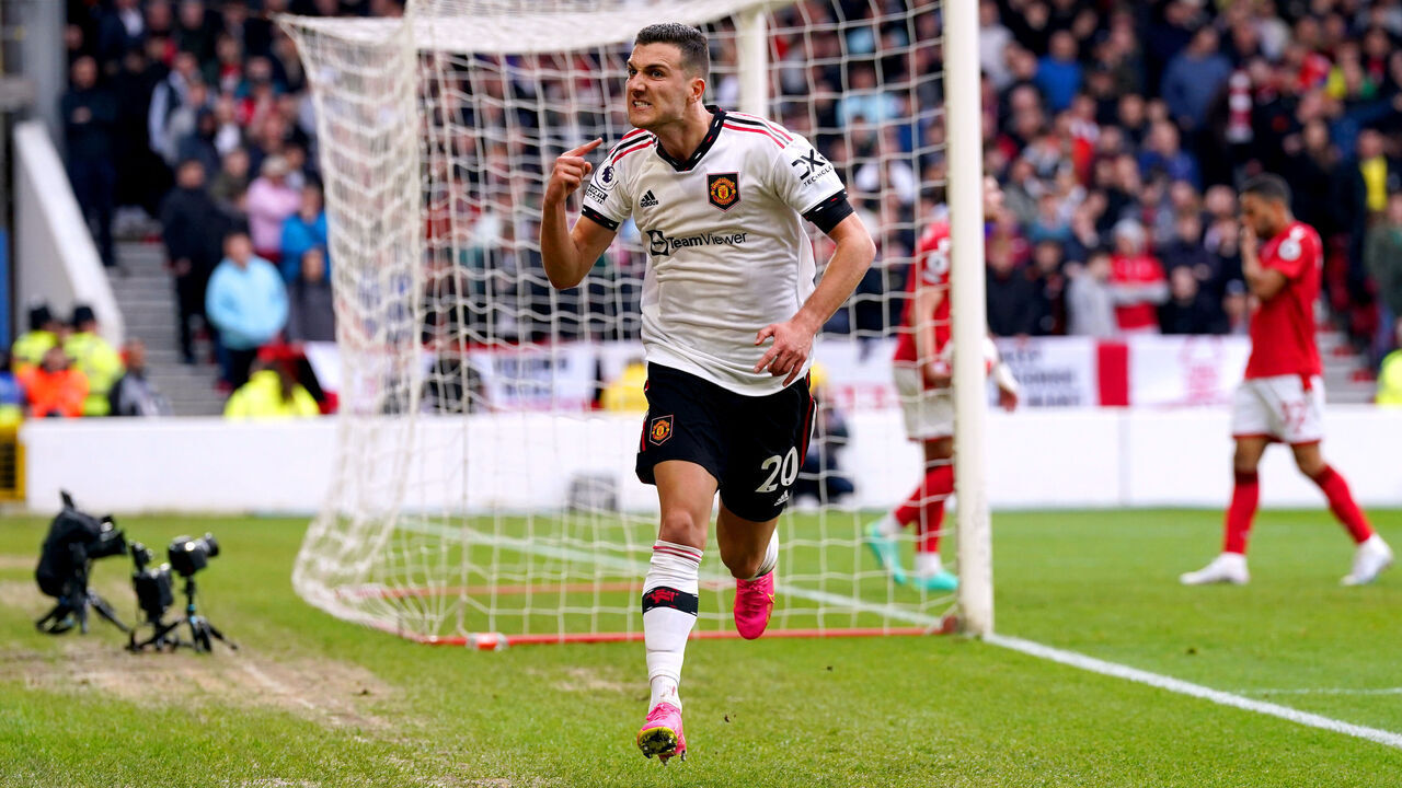 Manchester United's Diogo Dalot celebrates scoring their side's second goal of the game during the Premier League match at the City Ground, Nottingham. Picture date: Sunday April 16, 2023.
