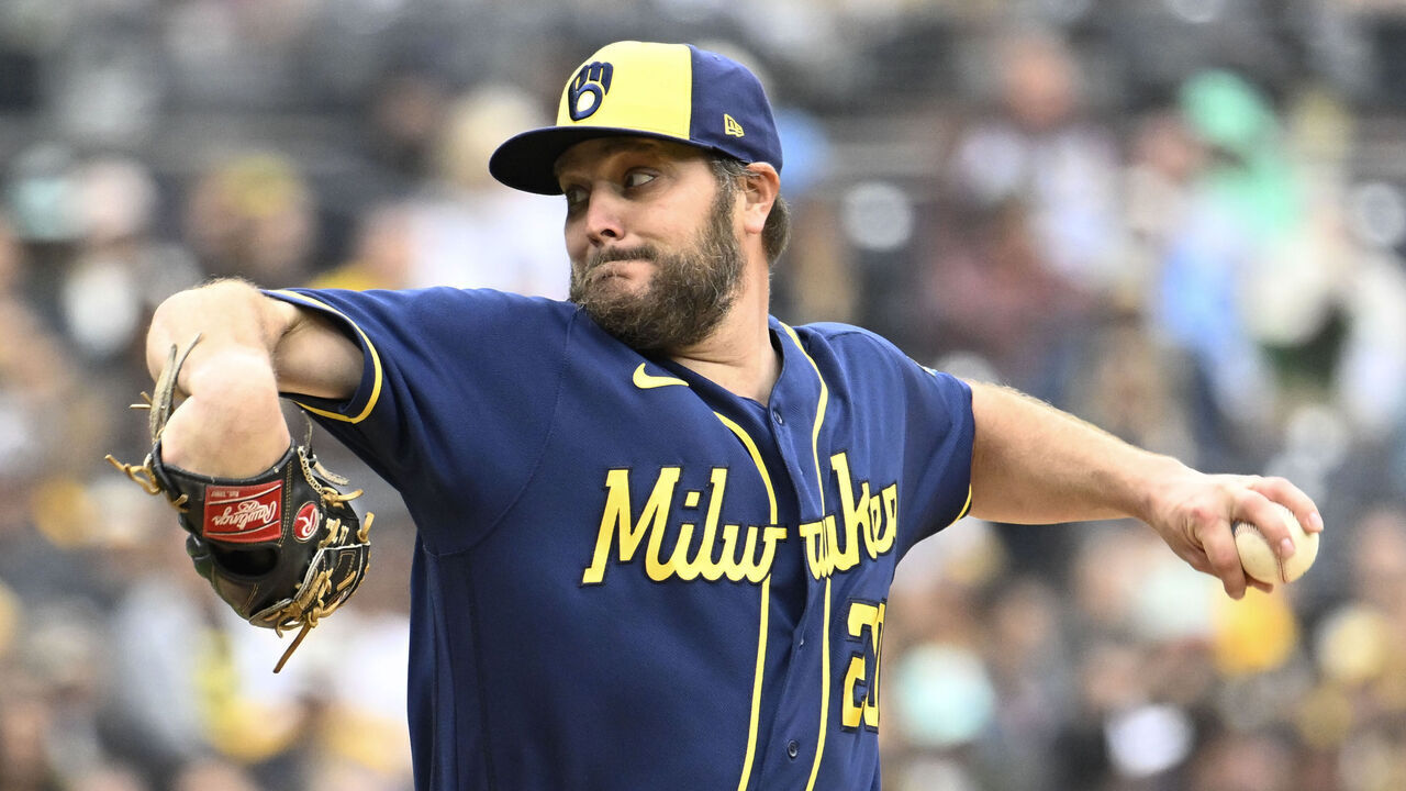 SAN DIEGO, CA - APRIL 16: Wade Miley #20 of the Milwaukee Brewers pitches during the first inning of a baseball game against the San Diego Padres April 16, 2023 at Petco Park in San Diego, California.