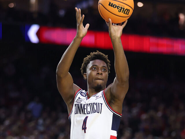 HOUSTON, TEXAS - APRIL 03: Nahiem Alleyne #4 of the Connecticut Huskies shoots the ball during the second half against the San Diego State Aztecs during the NCAA Men's Basketball Tournament National Championship game at NRG Stadium on April 03, 2023 in Houston, Texas.