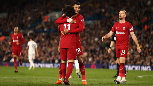 LEEDS, ENGLAND - APRIL 17: Mohamed Salah of Liverpool celebrates with teammate Cody Gakpo after scoring the team's fourth goal during the Premier League match between Leeds United and Liverpool FC at Elland Road on April 17, 2023 in Leeds, England.