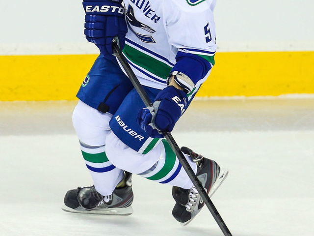 Canucks deal Jason Garrison to Lightning for 2nd-round pick