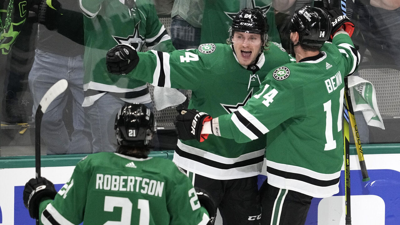 DALLAS, TEXAS - APRIL 17: Roope Hintz #24 of the Dallas Stars celebrates with Jamie Benn #14 and Jason Robertson #21 after scoring a goal during the second period against the Minnesota Wild in Game One of the First Round of the 2023 Stanley Cup Playoffs at American Airlines Center on April 17, 2023 in Dallas, Texas.