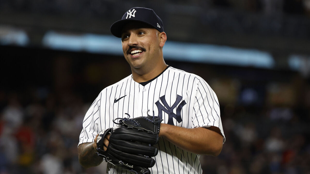 NEW YORK, NY - APRIL 3: Nestor Cortes #65 of the New York Yankees smiles during the game against the Philadelphia Phillies at Yankee Stadium on April 3, 2023 in New York, New York.