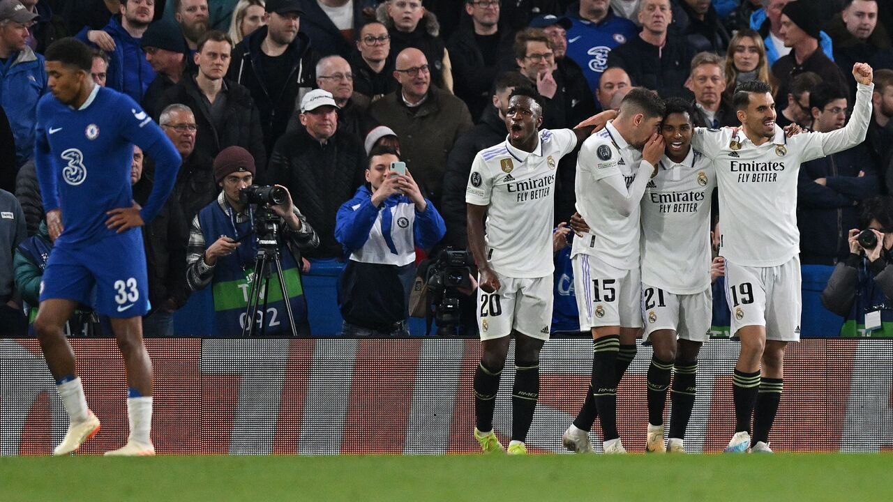 Real Madrid's Brazilian striker Rodrygo Goes (2R) celebrates scoring the team's second goal during the Champions League quarter-final second-leg football match between Chelsea and Real Madrid at Stamford Bridge in London on April 18, 2023.