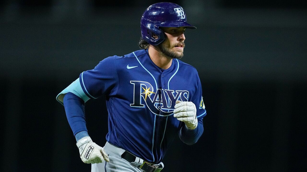 CINCINNATI, OHIO - APRIL 17: Josh Lowe #15 of the Tampa Bay Rays rounds the bases after hitting a home run in the ninth inning against the Cincinnati Reds at Great American Ball Park on April 17, 2023 in Cincinnati, Ohio.