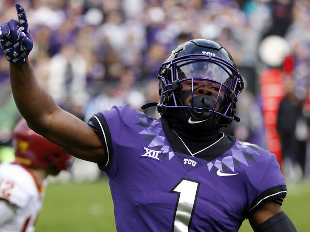 FORT WORTH, TX - NOVEMBER 26: Cornerback Tre'Vius Hodges-Tomlinson #1 of the TCU Horned Frogs reacts after sacking quarterback Hunter Dekkers #12 of the Iowa State Cyclones during the first half at Amon G. Carter Stadium on November 26, 2022 in Fort Worth, Texas.