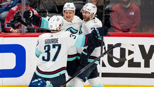 DENVER, COLORADO - APRIL 18: Eeli Tolvanen #20 of the Seattle Kraken celebrates with his teammates after scoring a goal in the first period of Game One of the First Round of the 2023 Stanley Cup Playoffs at Ball Arena on April 18, 2023 in Denver, Colorado.