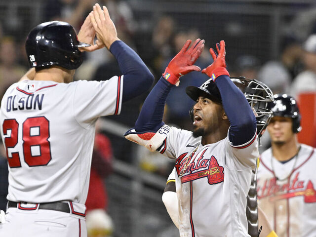 SAN DIEGO, CA - APRIL 18: Ozzie Albies #1 of the Atlanta Braves celebrates his three-run home run in the eighth inning with Matt Olson #28 against the San Diego Padres April 18, 2023 at Petco Park in San Diego, California.